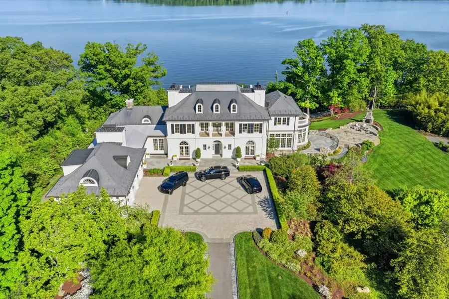 Aerial wide of the manor and motorcourt