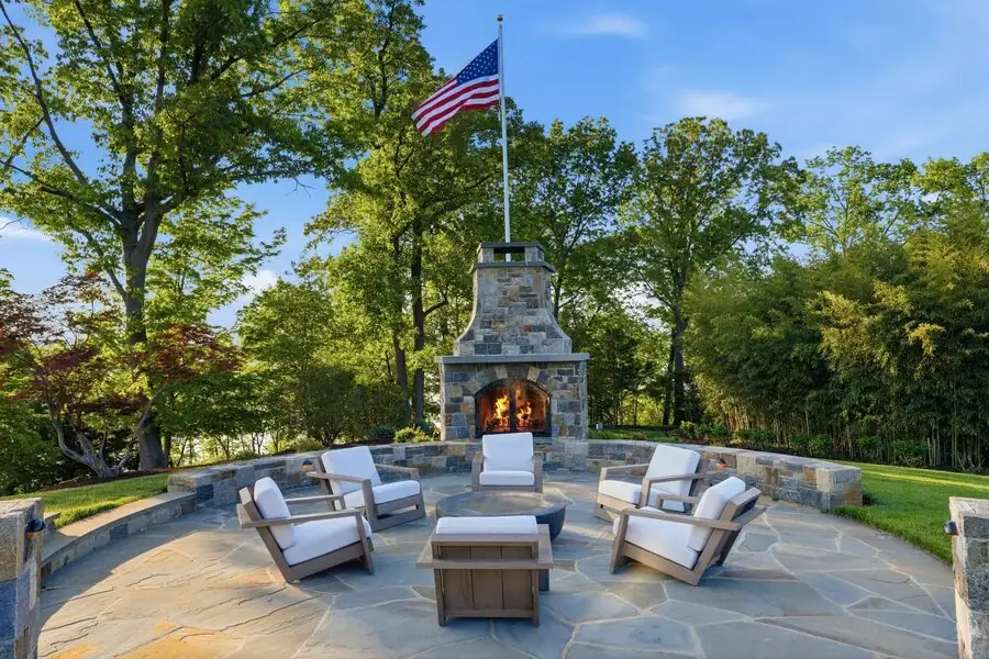 Stone firepit lounge with flag