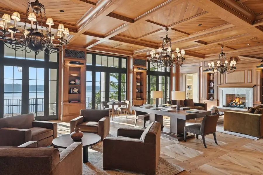 Cathedral cedar great room with stone fireplace