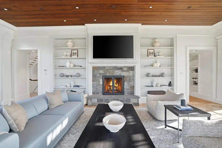 Marble-fireplace living with built-ins