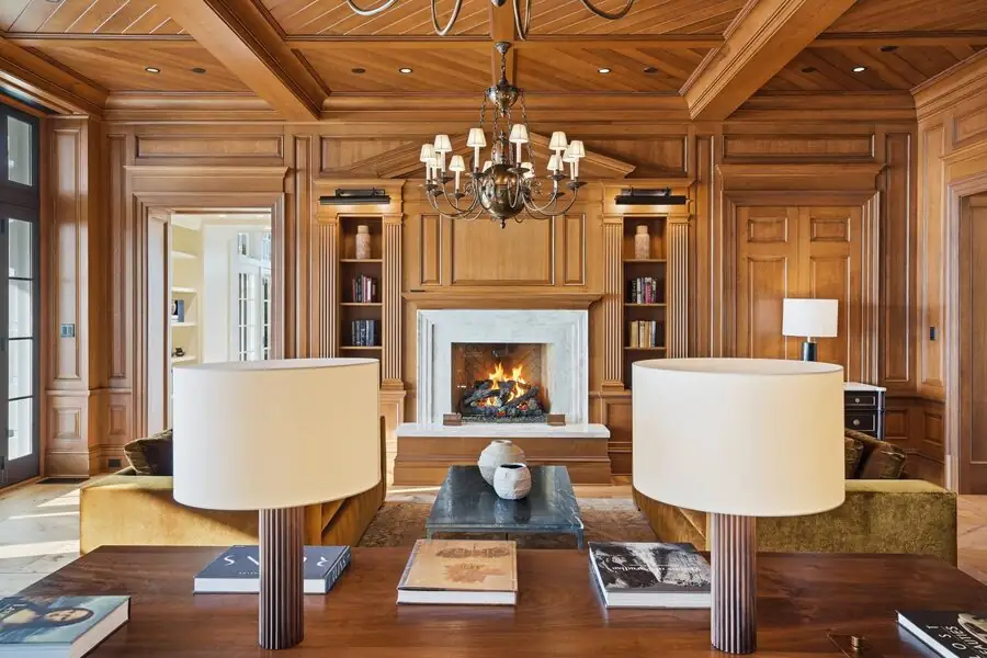 Coffered library lounge, stone fireplace