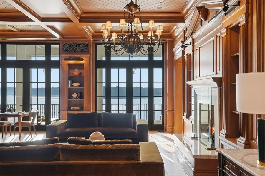 Wood-paneled office with stone fireplace