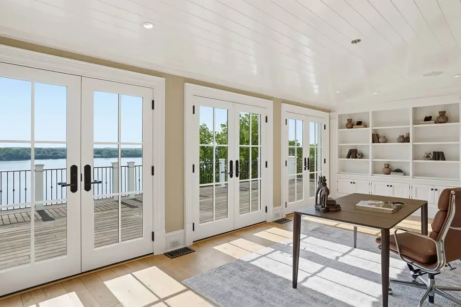 Shiplap office with French doors to the porch