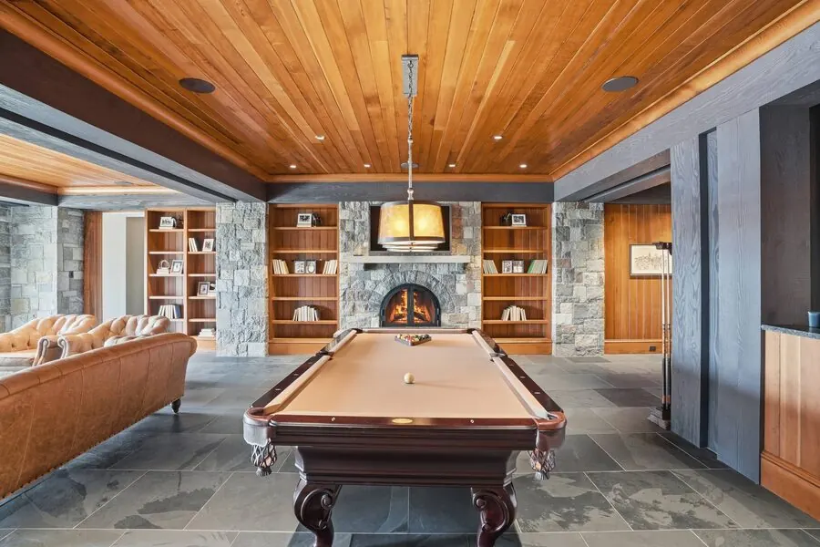 Billiards room beneath cedar coffers
